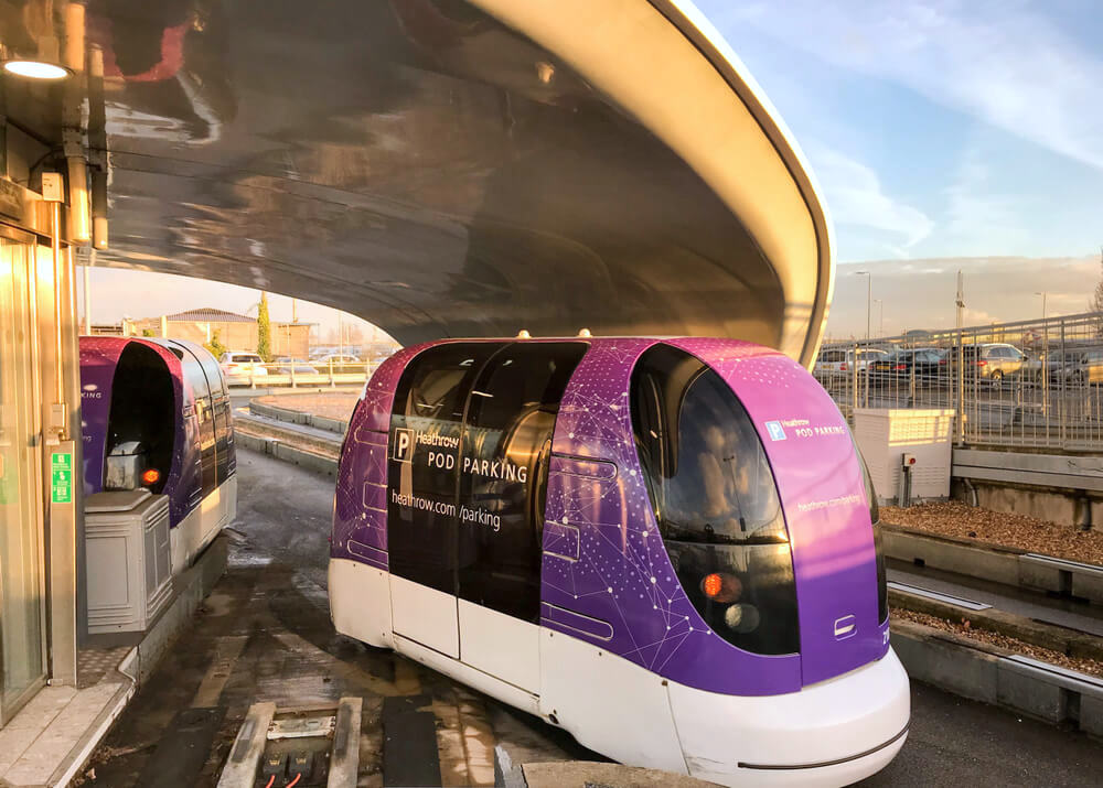 Heathrow Airport, London, England - January 2018: Driverless transport pod departs the station
